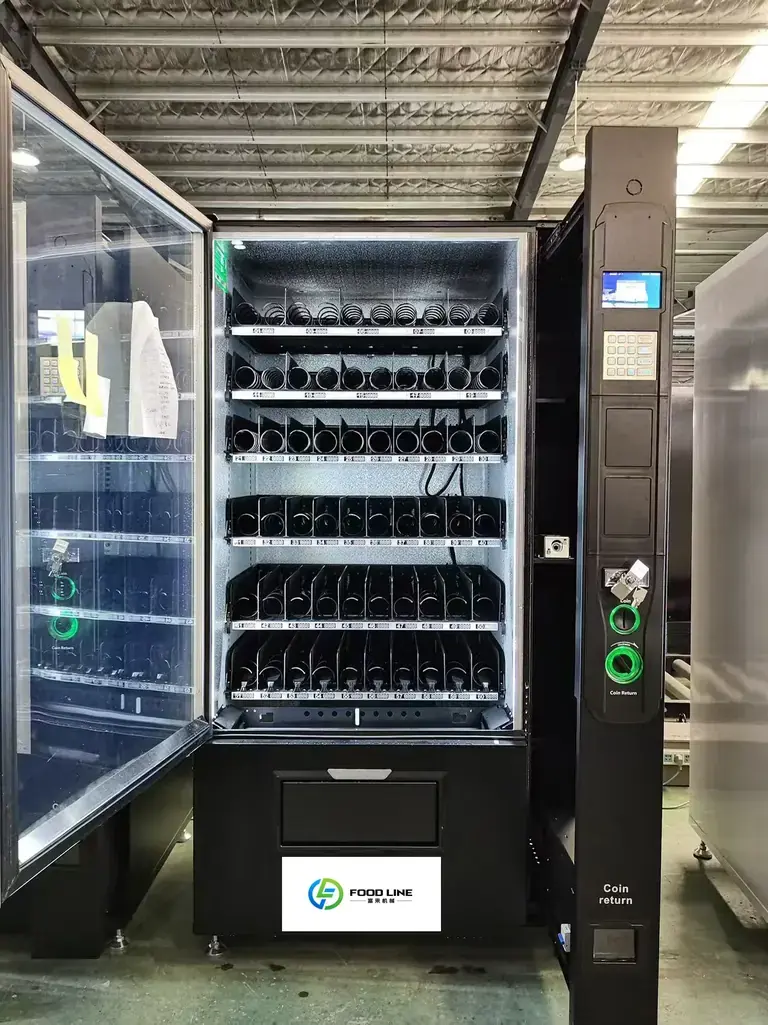 Open commercial vending cabinet showing shelves, channels and payment area